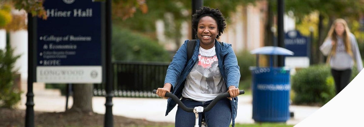 Longwood student on bike