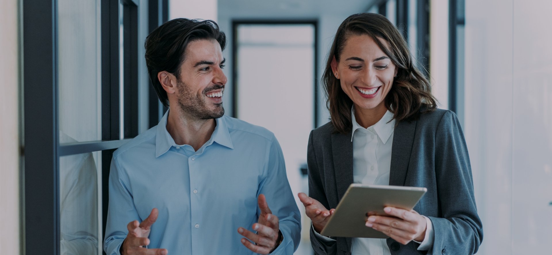 Finance professionals smiling at work